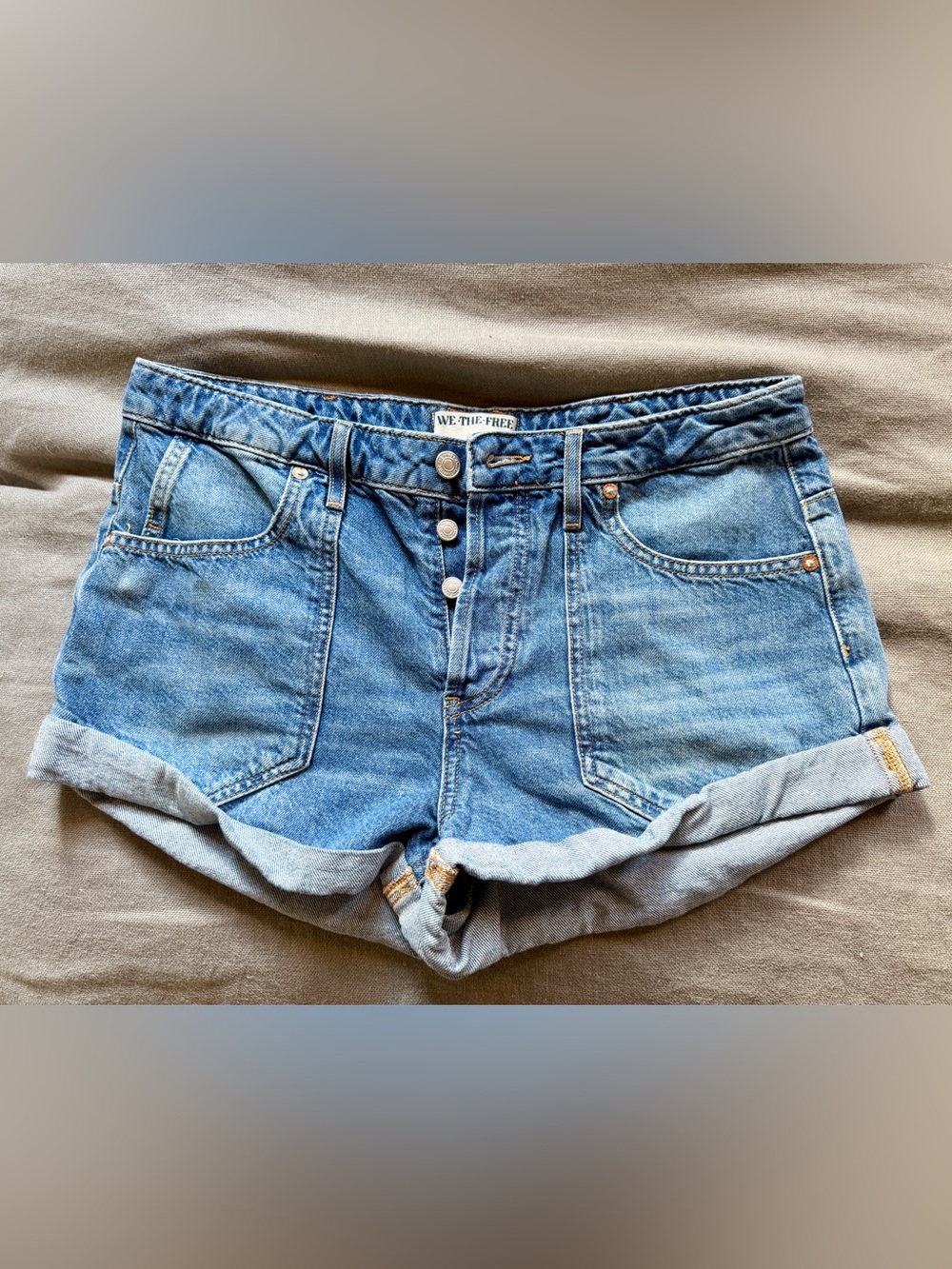 Free People button fly, jean shorts.